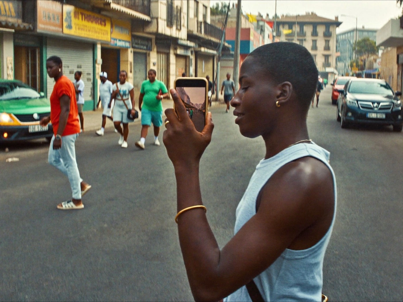 Streaming a video on the go on an African city street